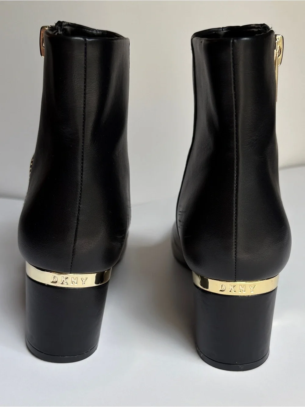 DKNY Women's Black Leather Block Heel Ankle Boots with Gold Accen
